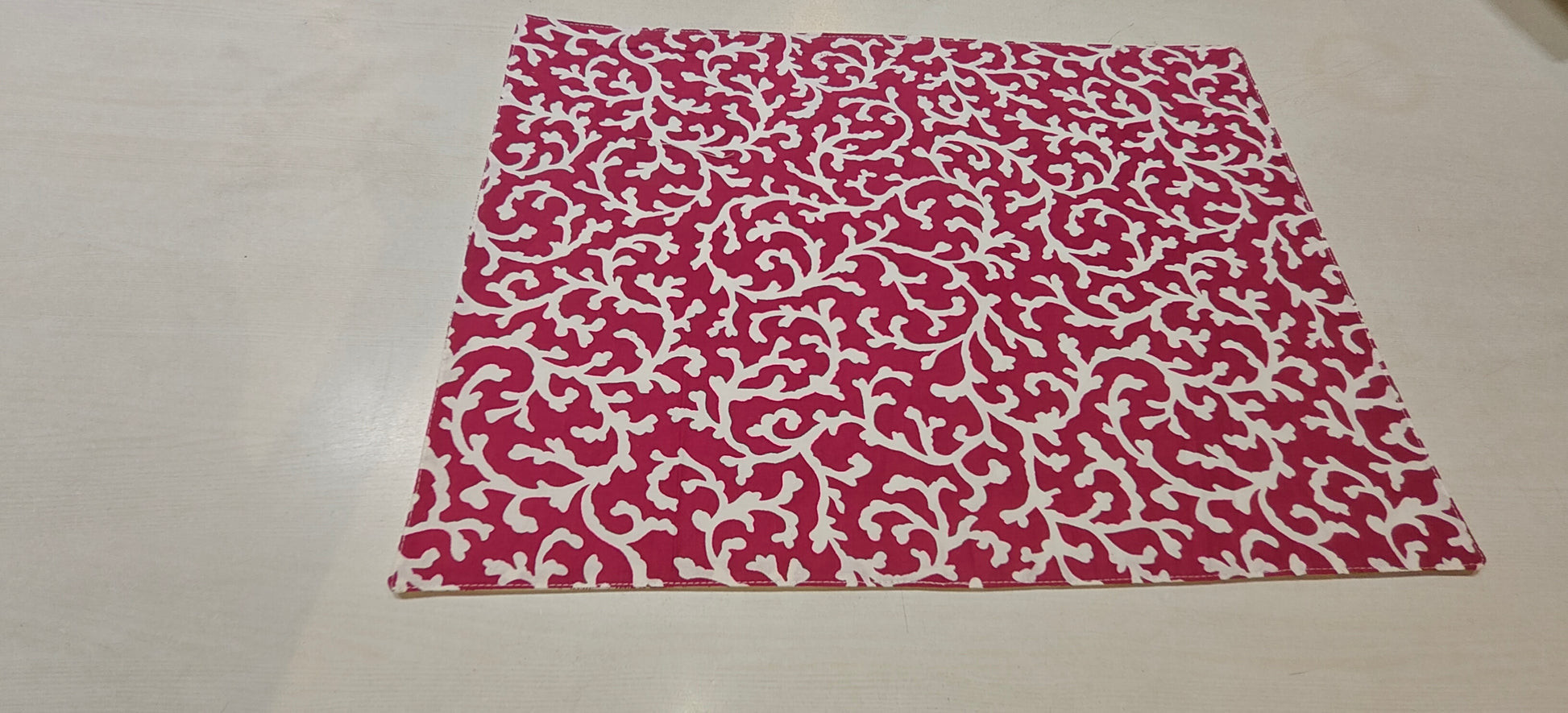 Red floral placemats styled on dining table - Viraasa