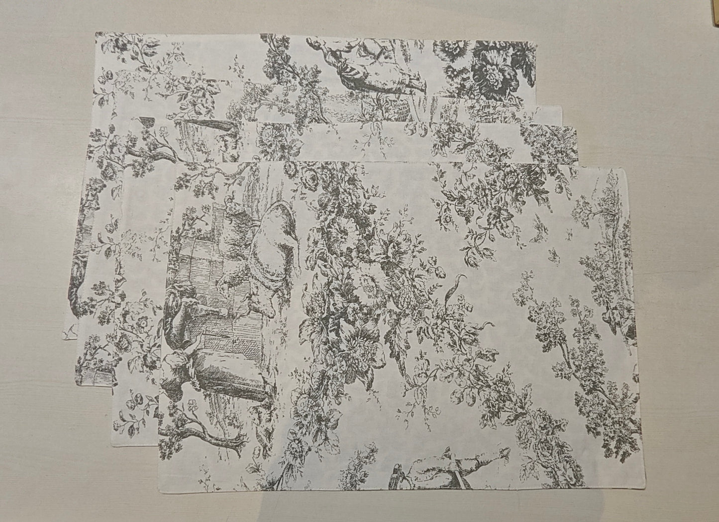 Grey and white design mat on a plain background