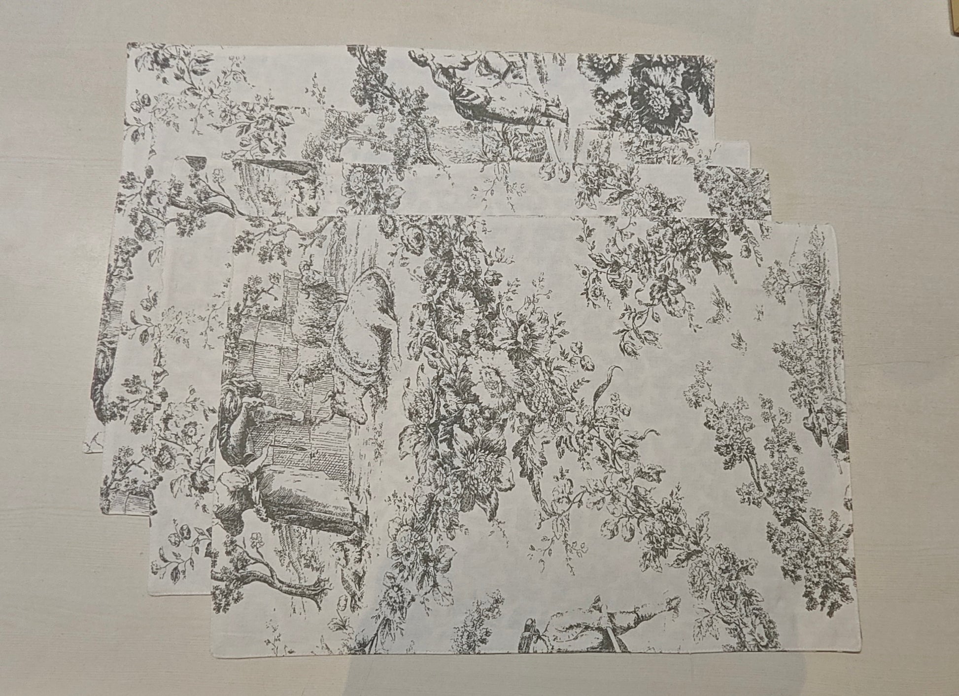Grey and white design mat on a plain background
