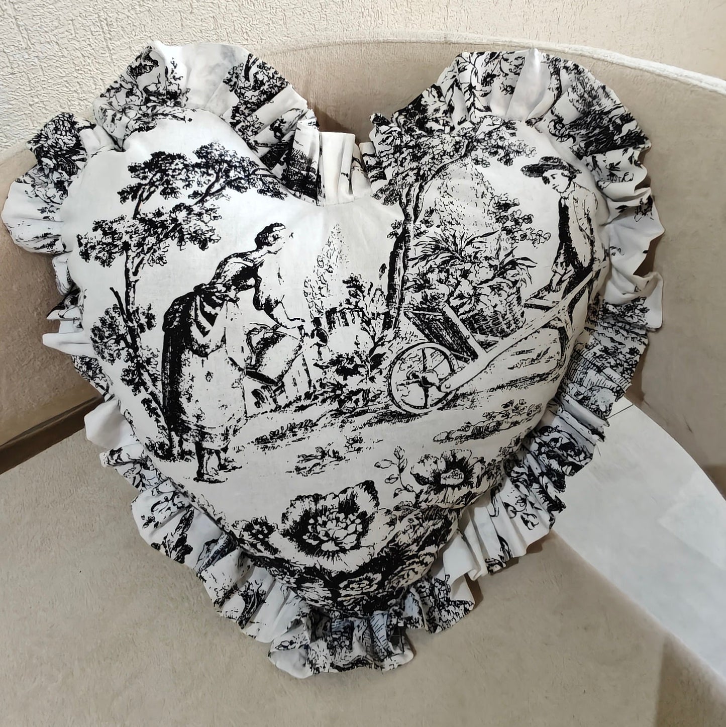 Black Toile heart cushion styled on sofa - Viraasa luxury home