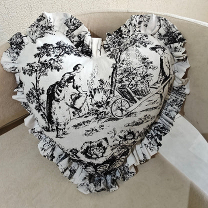 Black Toile heart cushion styled on sofa - Viraasa luxury home