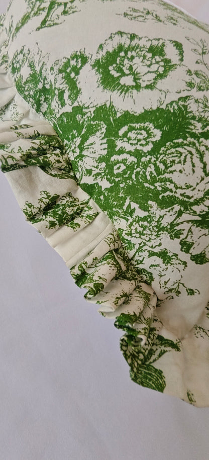 Close-up of green Toile pattern on heart cushion - Viraasa