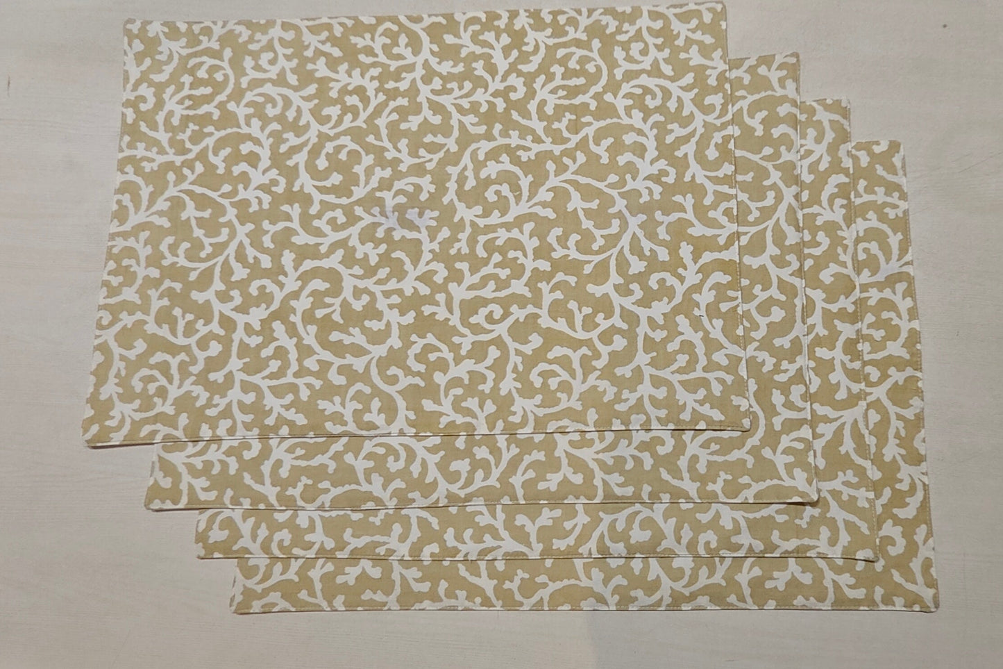 Golden floral placemat set full view - Viraasa luxury dining linens
