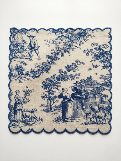 Decorative blue and white toile pattern Napkin on a white background