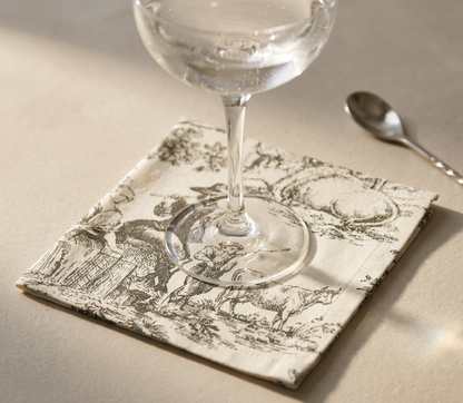 Grey Toile cocktail napkins styled on dining table - Viraasa