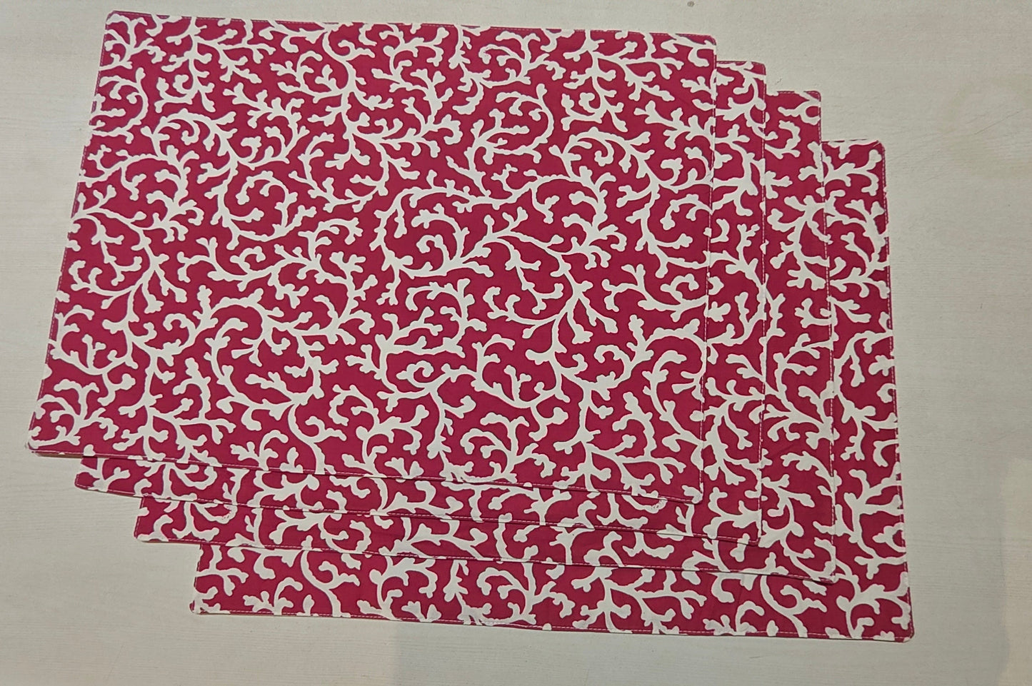 Red floral placemat set full view - Viraasa luxury dining linens