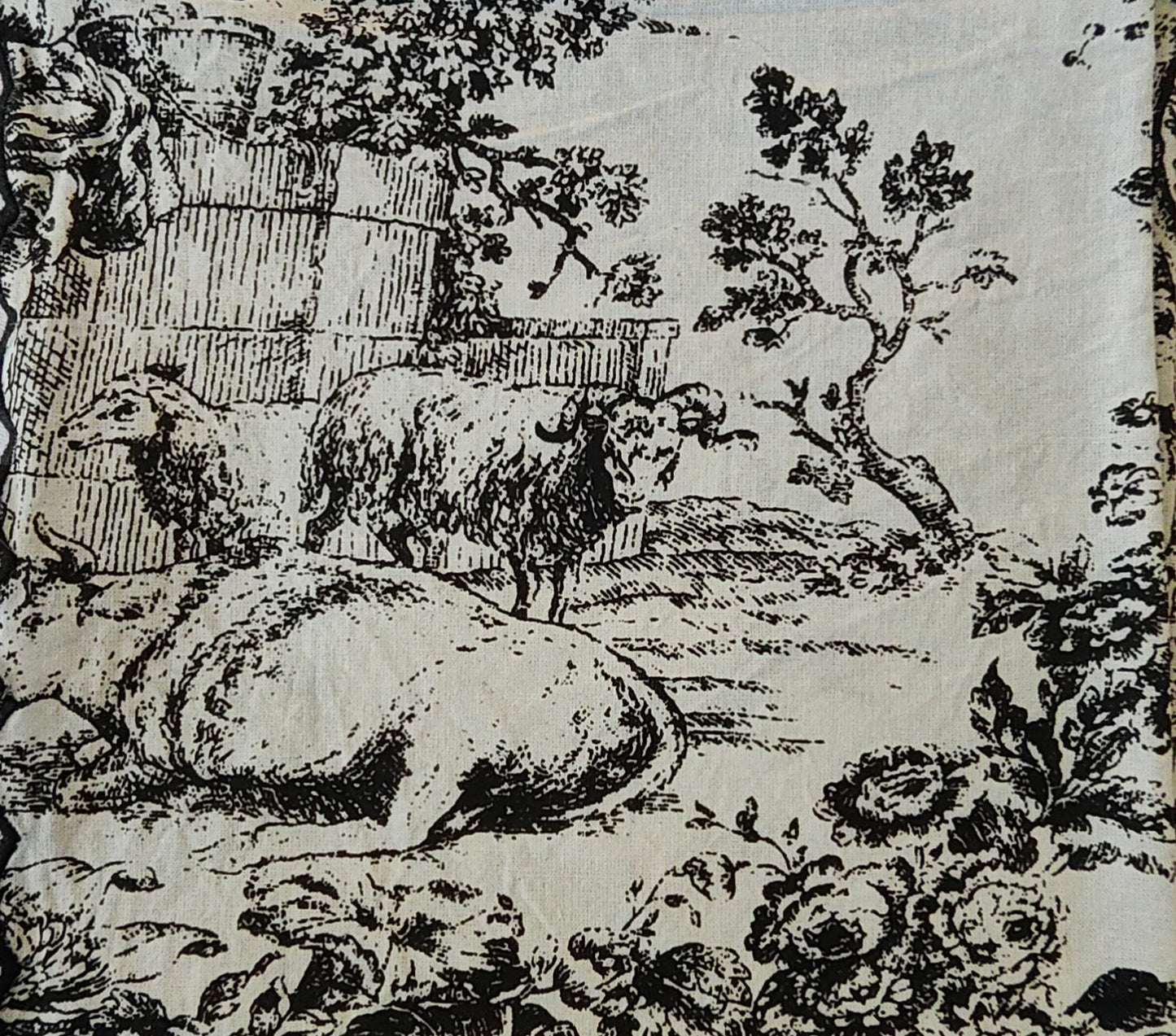Black and white illustration of sheep in a pastoral scene with trees and rocks.