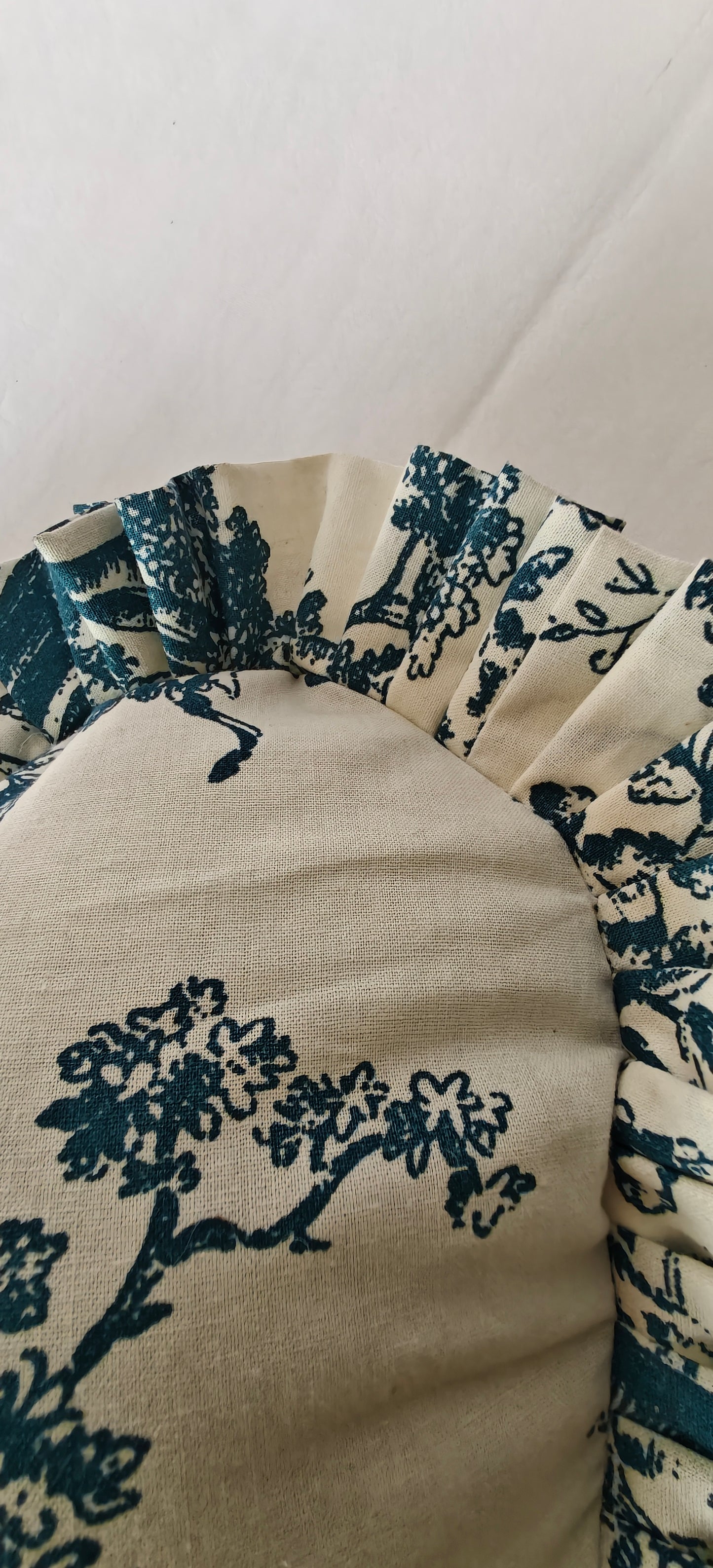 Close-up of blue Toile pattern on heart cushion - Viraasa