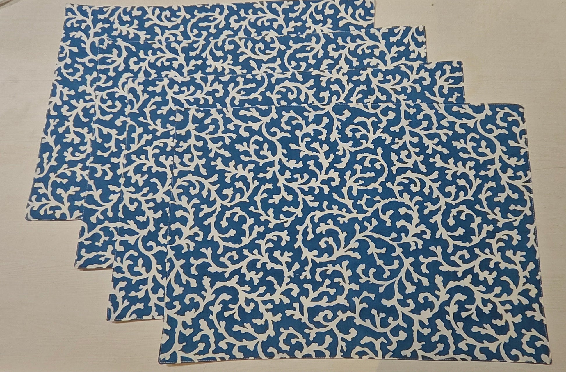 Blue floral placemat set full view - Viraasa luxury dining linens