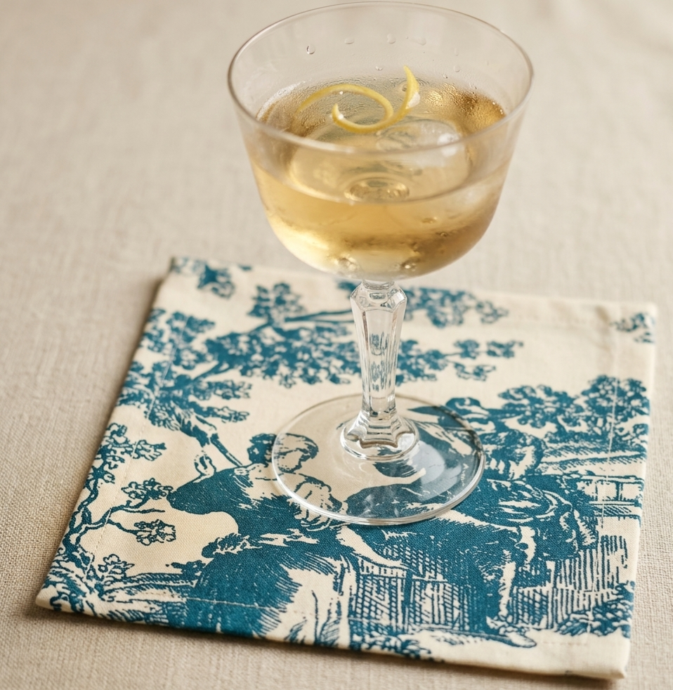 Blue Toile cocktail napkins styled on dining table - Viraasa