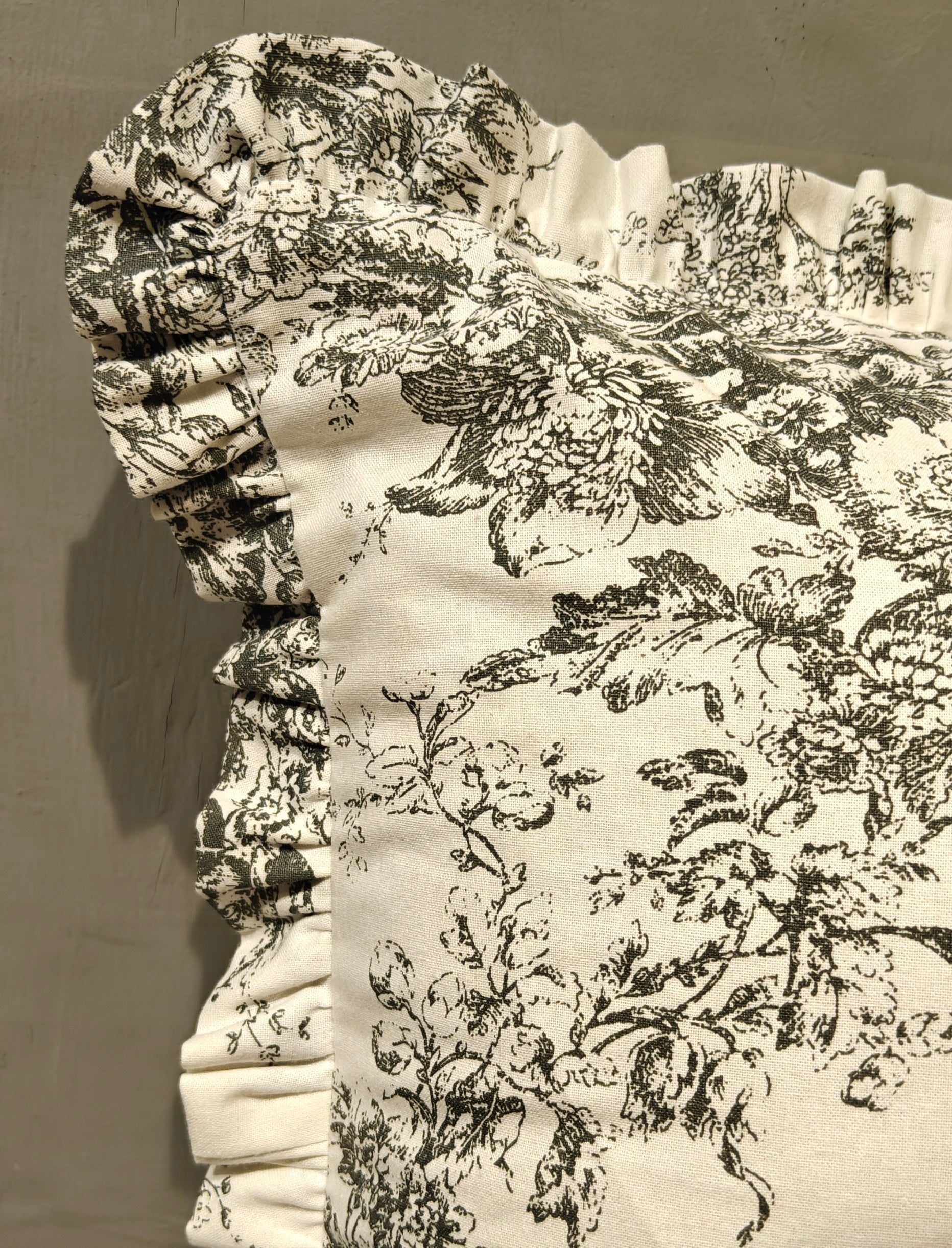 Close-up of grey Toile pattern on cotton cushion - Viraasa
