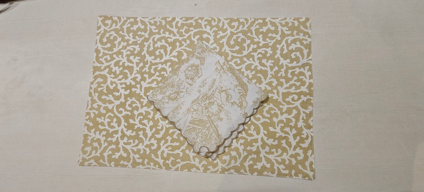 Stack of golden floral placemats - Viraasa luxury home