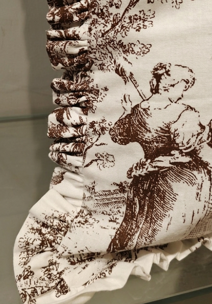 Brown Toile cushion styled on sofa - Viraasa luxury French linens