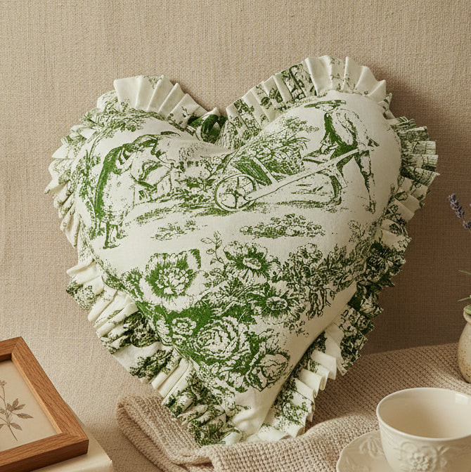 Green Toile heart cushion styled on sofa - Viraasa luxury home
