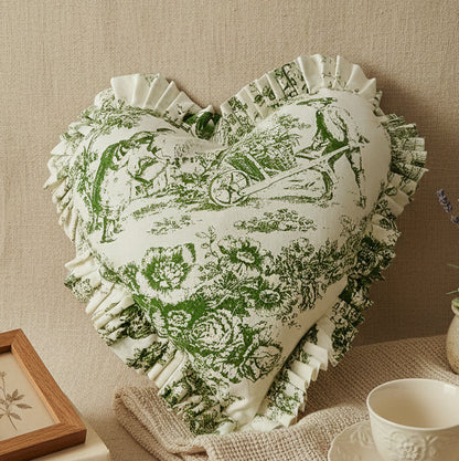 Green Toile heart cushion styled on sofa - Viraasa luxury home