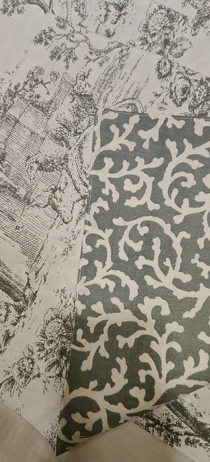 Close-up of a patterned fabric with intricate designs on a textured background