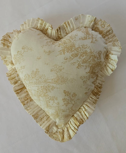 Beige Toile heart cushion styled on sofa - Viraasa luxury home