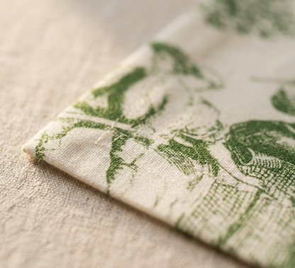 Close-up of Green Toile cotton napkin fabric - Viraasa luxury